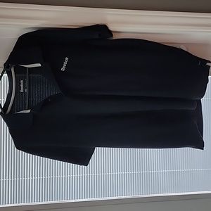 Mens Reebok XL polo shirt.  Black in color.